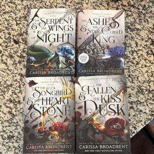 Crowns of Nyaxia Series by Carissa Broadbent